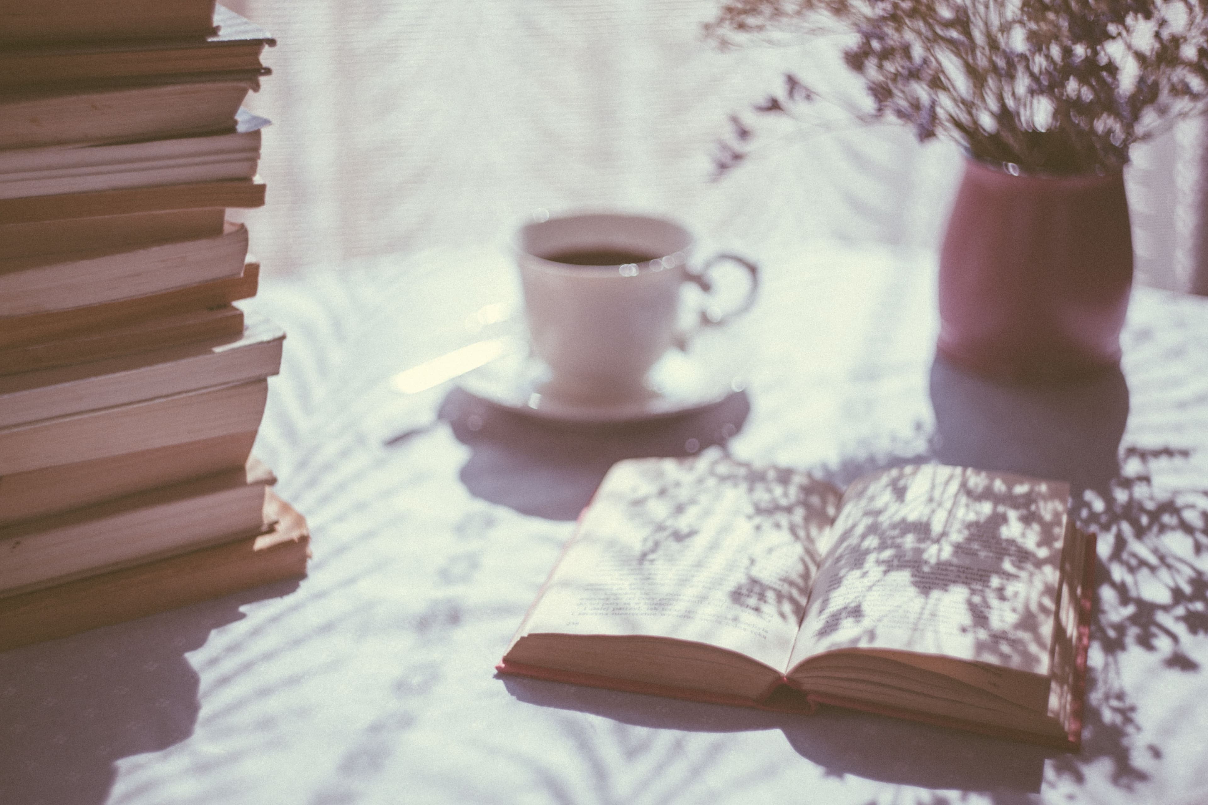 Coffee and book representing a daily habit cue